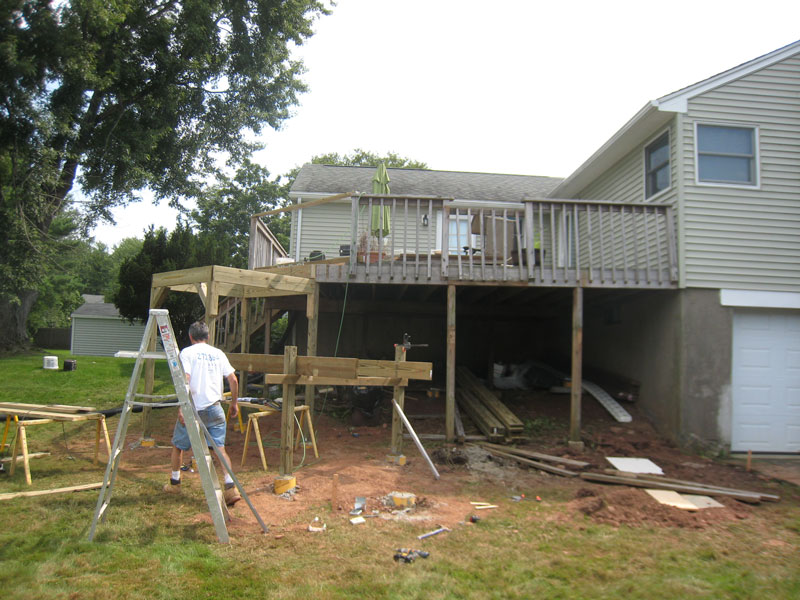 Kelley Carpentry was hired to replace this old and unsafe deck with proper structure, using composite materials.