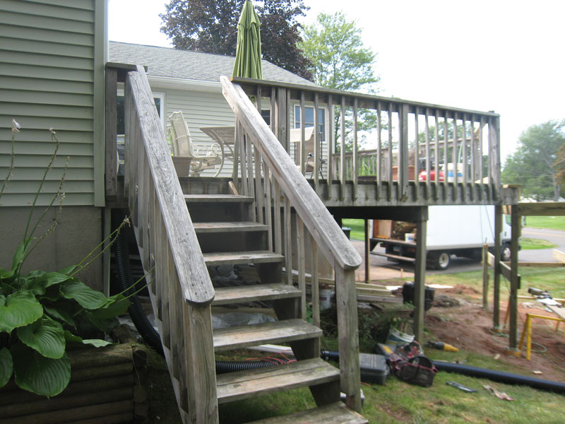 Kelley Carpentry replaced these worn-out stairs with solid composite materials.