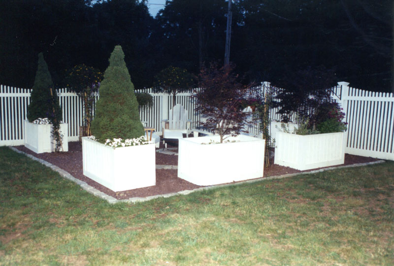 Have Kelley Carpentry place planters for large plants on your property.
